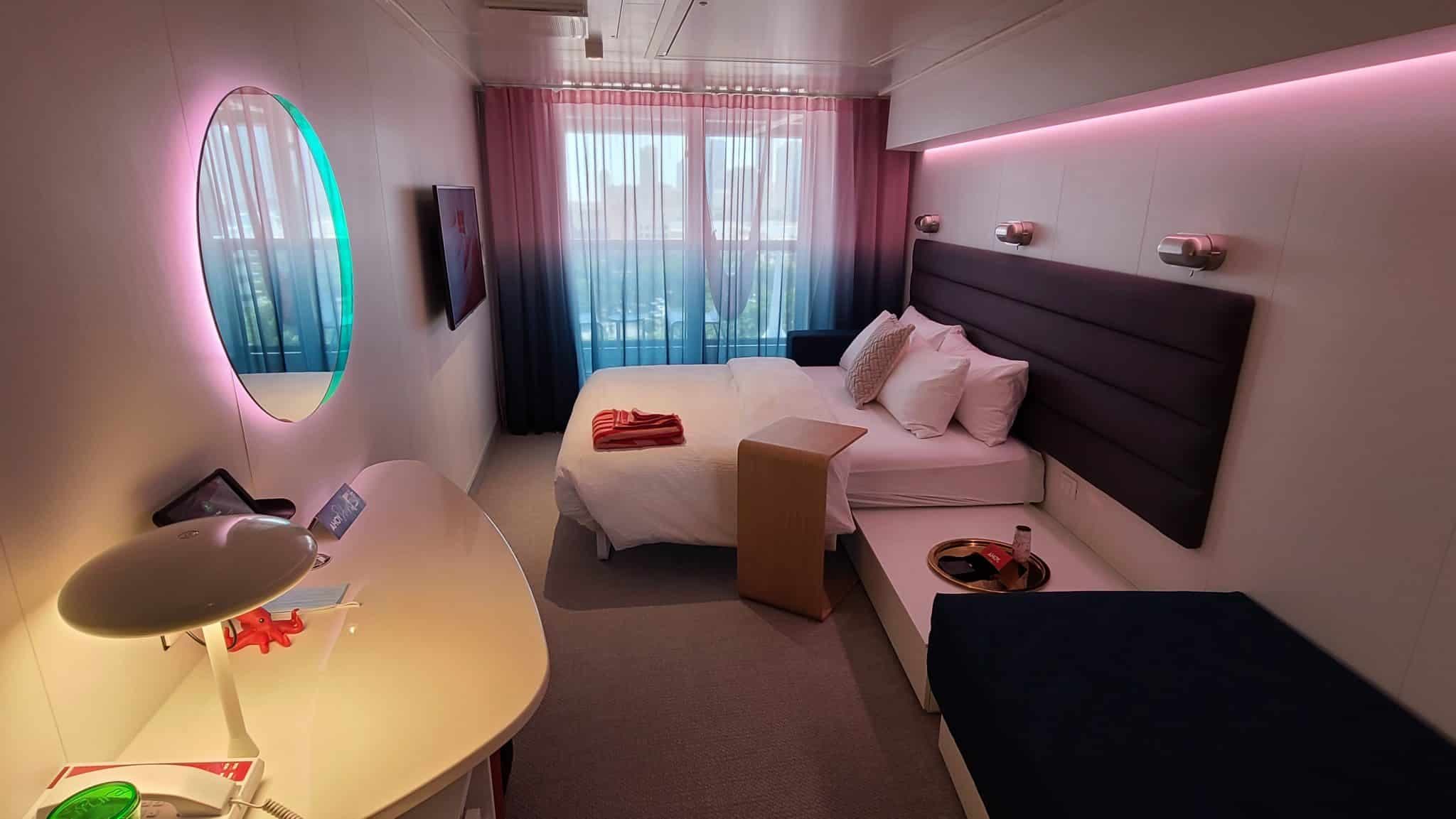 A cabin aboard a Virgin Voyages ship