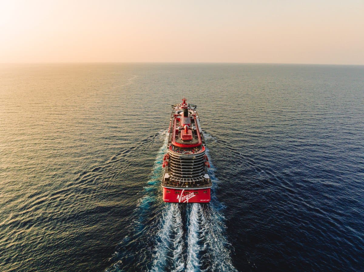 A Virgin Voyages ship at sea, from above