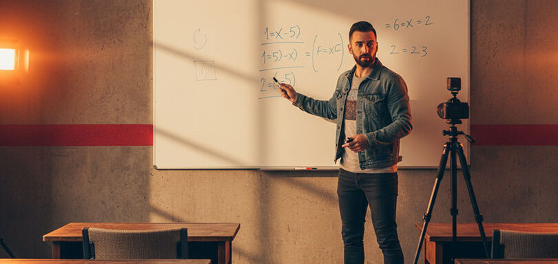Man recording classroom