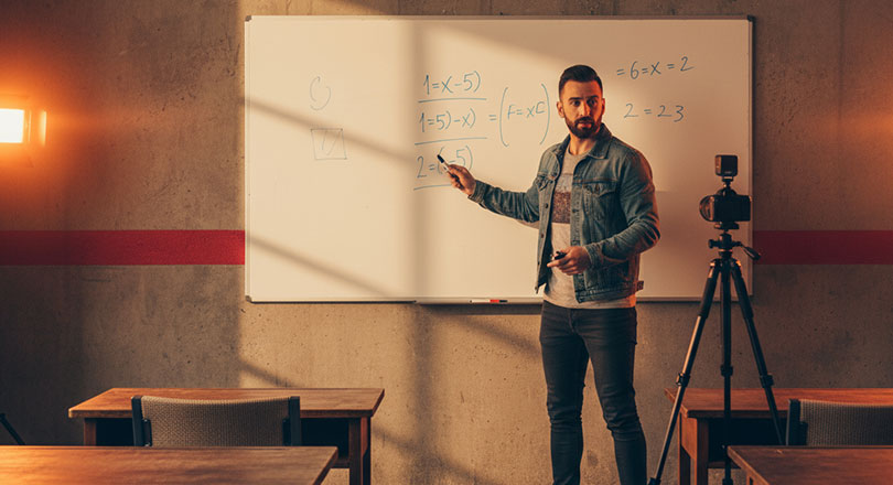 Man recording classroom
