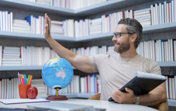Teachers day teacher tutor in school classroom knowledge education